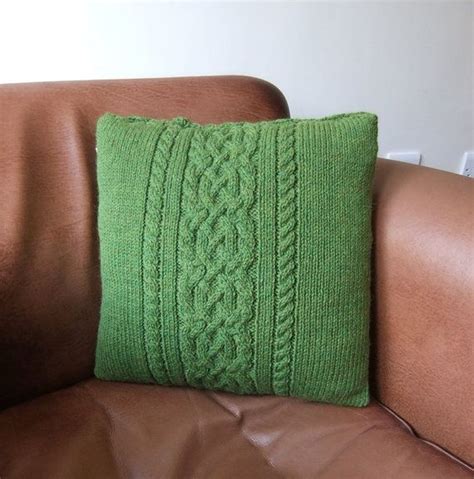 These chunky knitted items look so cozy and warm for the fall and winter seasons. Knitted pillow cover...need to learn how to do the cable stitch! (With images) | Knit pillow ...