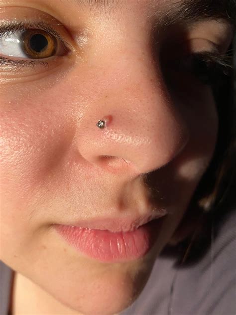 i just got my nose piercing about two months ago i ve been cleaning it every day although some