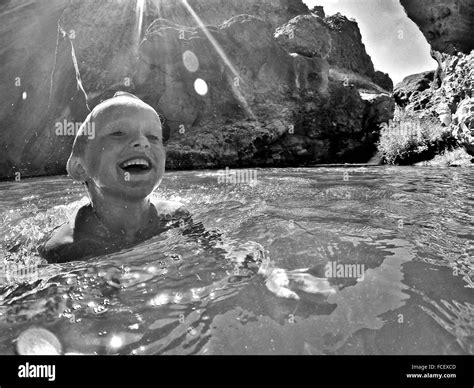 Boy Swimming In Lake Stock Photo Alamy