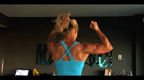 Muscular Fitness Woman Flexing Her Powerful Steel Ripped