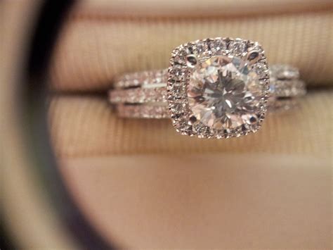 If you want to give your ring a different look all together, consider adding a halo of diamonds around your center stone. My darling husband purchased this ring for me... I lost ...