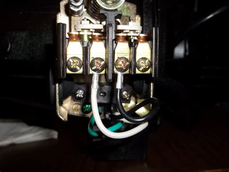 Water pressure switches in well systems control the amount of water pumped to the system's storage tank. How do I wire a power cord into a 115v shallow well jet pump?