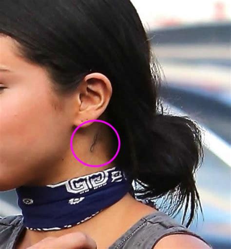 Instagram user @theselenarundown wrote that this marks gomez's 14th tattoo to date, meaning that the singer. Selena Gomez Shows Off New Behind-the-Ear Neck "g" Tattoo ...