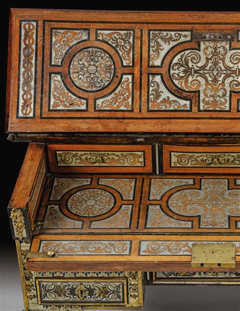 An Ebony Amaranth Copper And Pewter Marquetry Bureau BrisÉ Louis Xiv