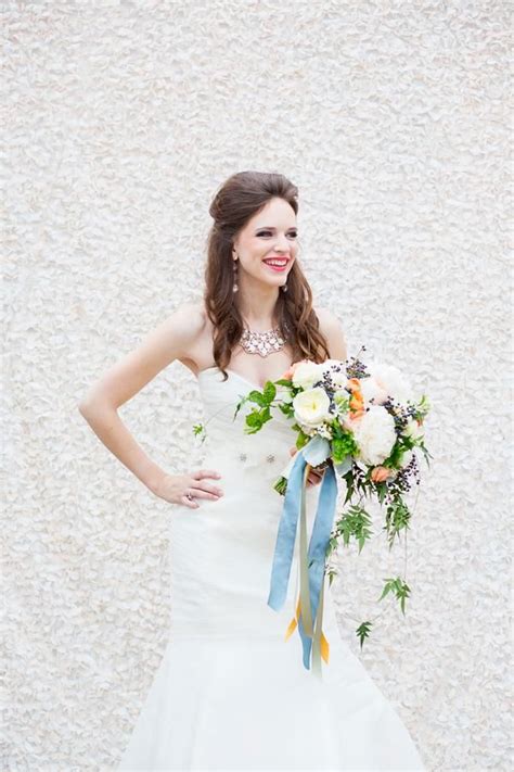 Bride With Streaming Blue Ribbon Bouquet Photo By Annabella Charles