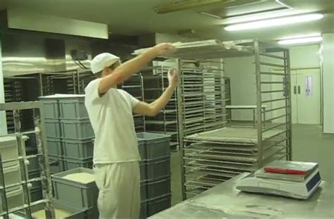 A very enthusiastic and efficient bread maker at work.