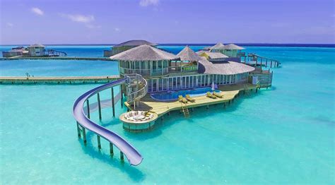 these villas in the maldives have slides to take you right into the water lonely planet