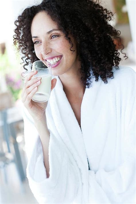 Woman Drinking Milk Photograph By Ian Hooton Science Photo Library Pixels