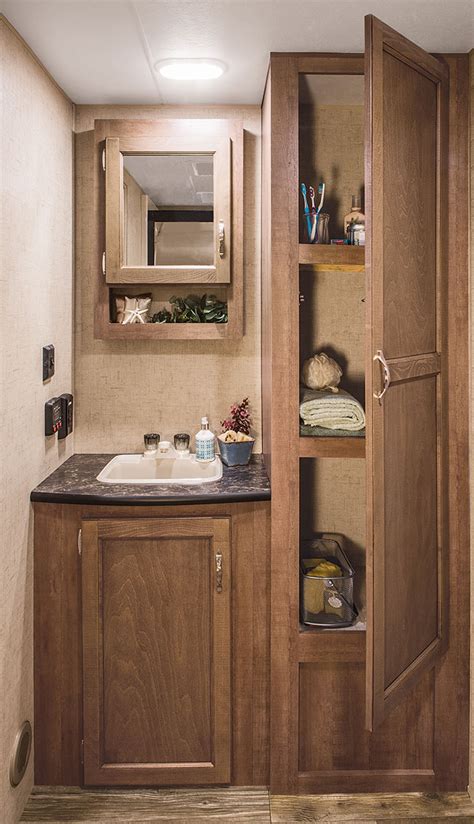 The outdoor kitchen in this travel trailer is pretty standard: 2016 MXT MXT3030 Lightweight Travel Trailer Toy Hauler | KZ RV