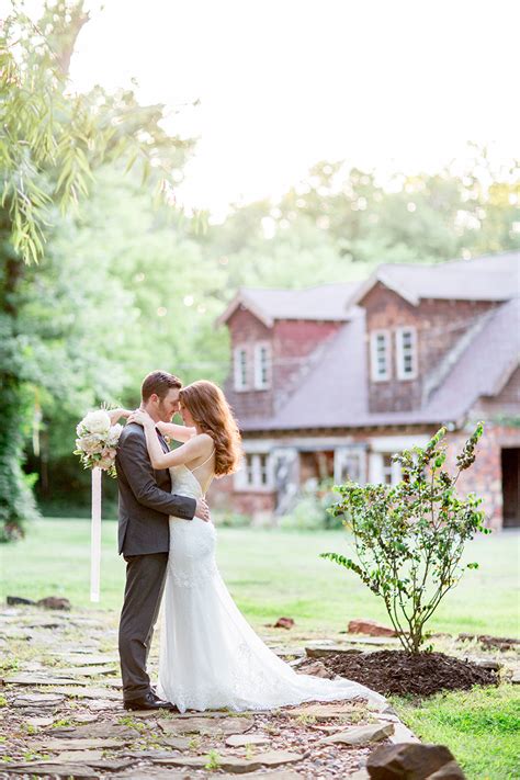 Bride and groom being silly and laughing. Oklahoma Barn Wedding Venue: The Stone Barn