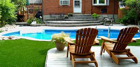 Artificial turf, a synthetic grass, was created for use in sports arenas. Artificial Landscape Around Pool | Artificial Grass ...