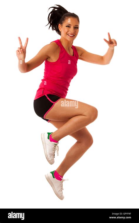 Active Woman Doing Aerobics For A Cardio Training Dancing Stock Photo