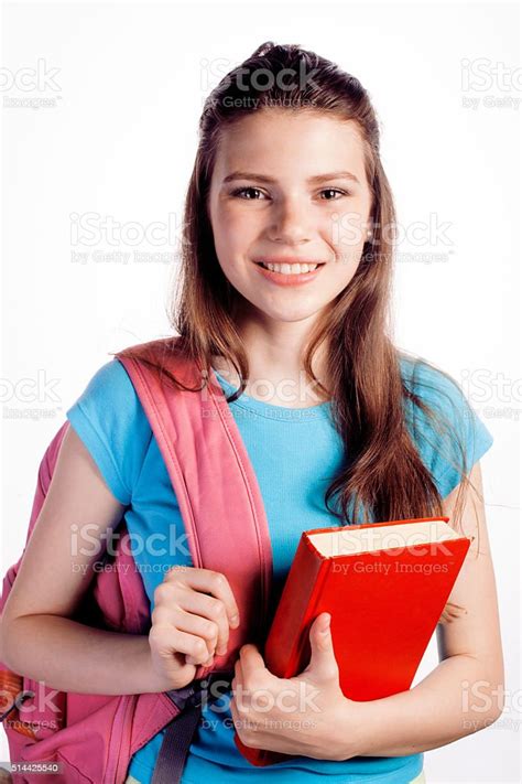 Young Cute Teenage Girl Posing Cheerful Against White Background With