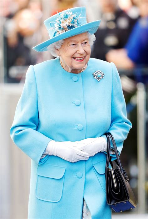 The Symbolic Significance Of The Queens Turquoise Brooch From Her