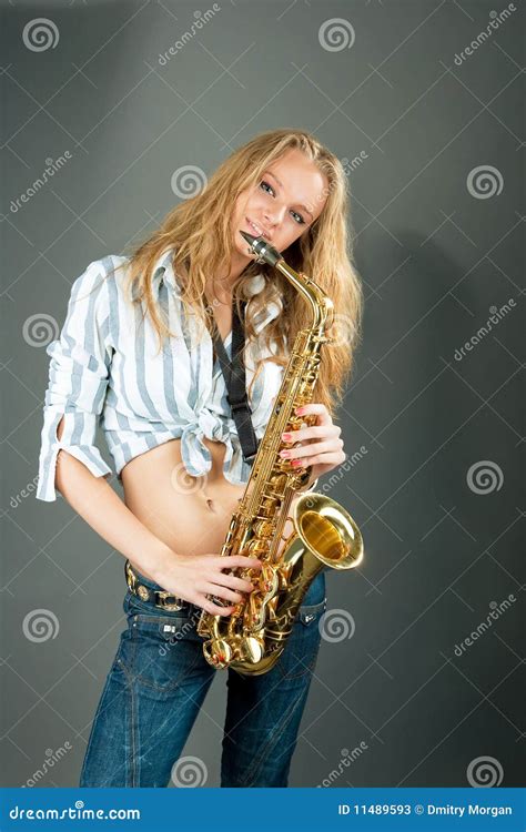 sensual smiling yong blonde with saxophone stock image image of background belt 11489593