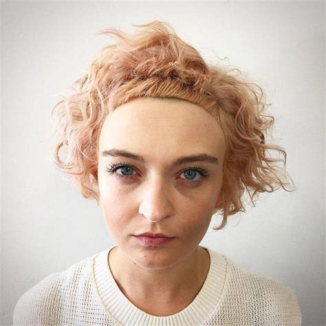 Messy bob haircut is one of the latest hairstyles on this list. Soft Rose Gold Bob with Undone Curly Fringe and Micro Bangs Short Hairstyle #curlybangs | Short ...