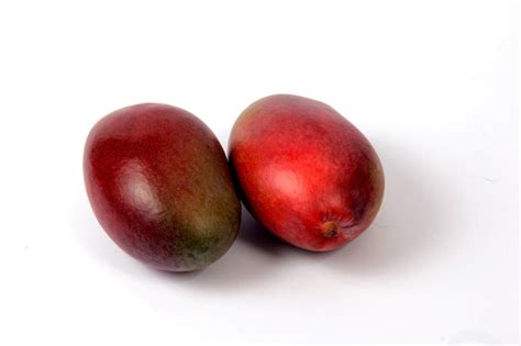 Premium Photo Red Mango Fruit On A White Background