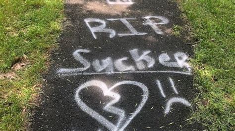 Police Rip Sucker Spray Painted On Sidewalk Near Scene Of Death