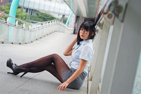 asian model women dark hair long hair sitting high heels wallpaper resolution 1920x1280 id