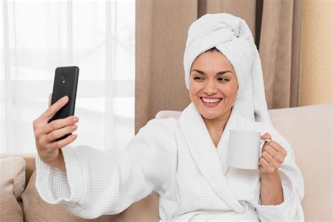 Free Photo Woman Taking Selfie In Hotel Room