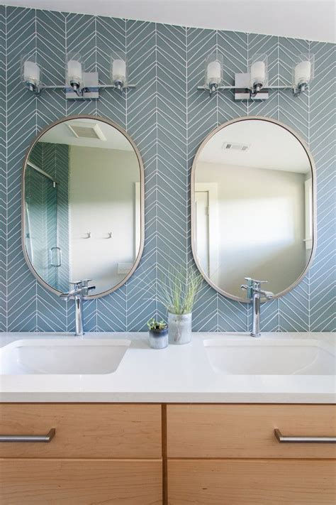 Made in the usa, this mirror strikes an elongated octagonal silhouette. The Best Oval Mirrors for your Bathroom | Mirror ...