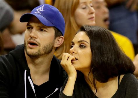 Mila Kunis And Ashton Kutcher Adorably Caught On Kiss Cam See The