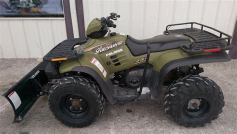Lift the pod slightly while depressing the tabs at t he rear of the pod. Polaris Sportsman 500 Remington Edition Motorcycles for sale