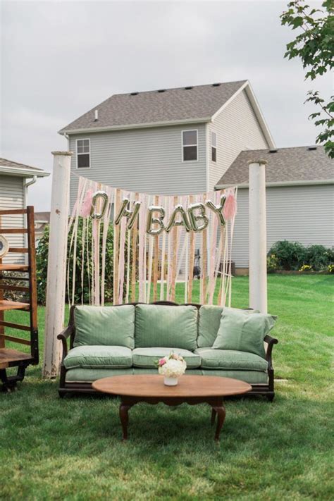 Mom playing with baby while taking shower. Charming Backyard Baby Q Shower Tablescape BBQ