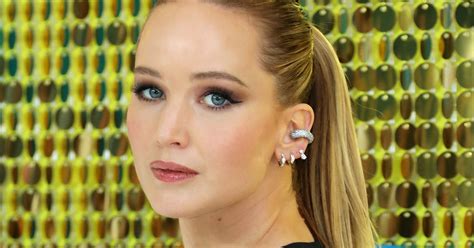 Jennifer Lawrence Wears A Sheer Dress And Gloves For London Premiere