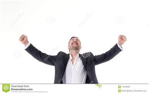 A Young Man Joyously Throws His Hands Up In The Air Stock Image