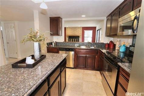 New caledonia is an amazing stone made up of a grey base with black and beige veins. New Caledonia Granite Countertops (Pictures, Cost, Pros ...
