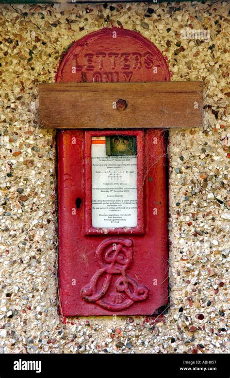 Old Disused Sealed Red Post Box In The Wall Of A House Near Machynlleth