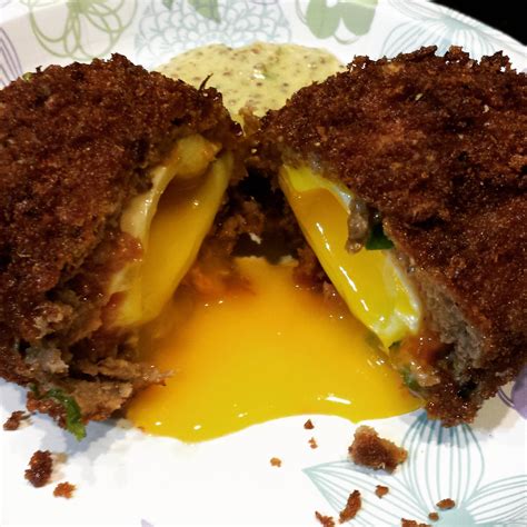 Get your eggs cooked in the water of the bowl onto the spoon and load them into the water that way they don't hit. scotch eggs recipe gordon ramsay