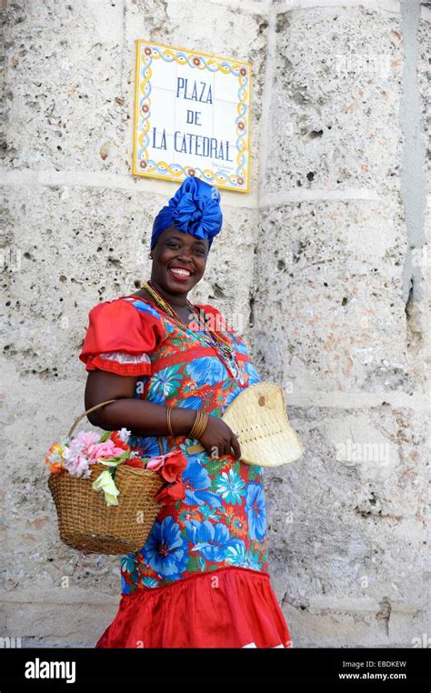 Afrocuban Lady With Flowers And Traditional Costume In La Havana Cuba