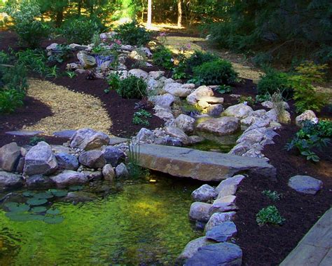 Custom Made Backyard Stream And Stone Bridge Backyard Stream Garden