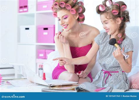 mother with cute daughter doing makeup stock image image of cute real 101541763