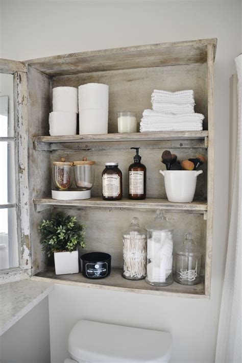 Catering to different households, what were once considered 'fancy features' in bathroom storage ideas are now the norm. DIY Bathroom Cabinet - Liz Marie Blog