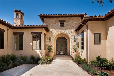 I think the smoother look of the stucco and the. Beige stucco siding exterior mediterranean with stone ...