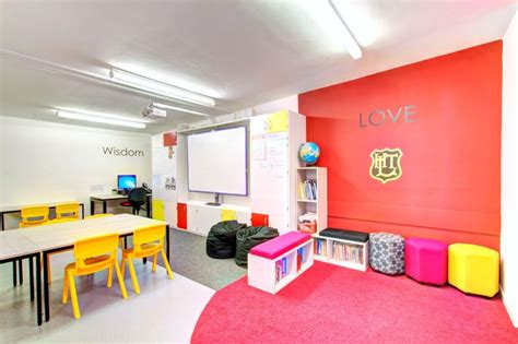 A Modern School Classroom Design With Whiteboard And A Reading Area For
