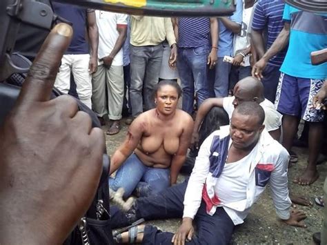Photo Female Robbery Gang Leader Stripped Naked By Mob In Port