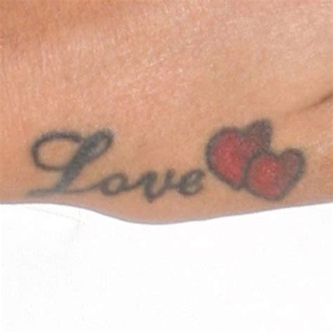 One can turn this tattoo more adorable by adding a banderole to the neck of this dove or by engraving the name of. Monica Brown Heart, Writing Side of Hand Tattoo | Steal ...