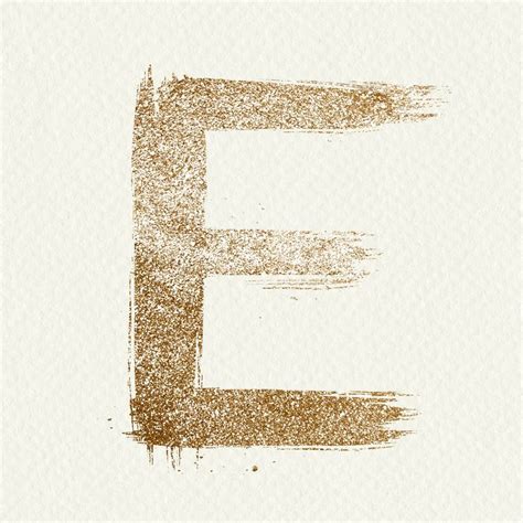The Letter E Is Made Up Of Gold Glitters On A White Background With An