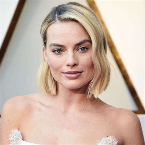 Margot Robbie Sports New Moody Brown Hair On Set For New David Orussell Film