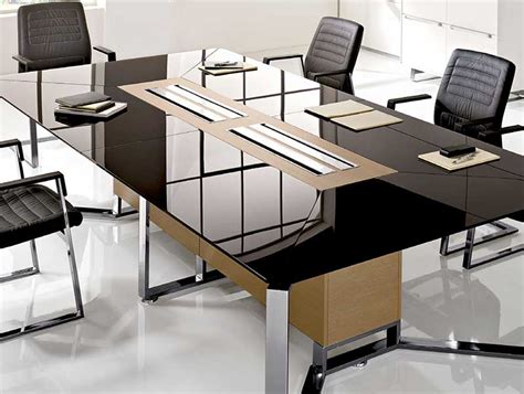 Table de conférence moderne conçue à partir dun ensemble de dalles parota assorties à un livre de bord en direct. Tables de reunion classic I meet verre | i bureau.net