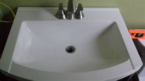 Mounting a light fixture on top of a bathroom vanity mirror is a beautiful way to add light, height, and. bathroom - What can be done about a vanity top not flush ...