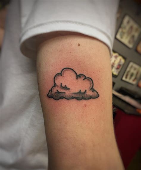 Cute Little Cloud Tattoo By Kirk Budden