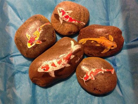 Beautiful Smooth River Rocks With A Koi Fish Painted With Acrylic Then