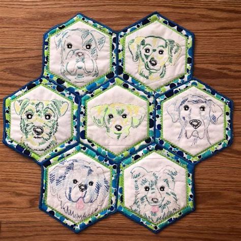 The arm holes are gentle curves inwards, and first, we'll cut out top piece because it involves the embroidery. Zig Zag Dogs Redwork Applique Machine Embroidery Design