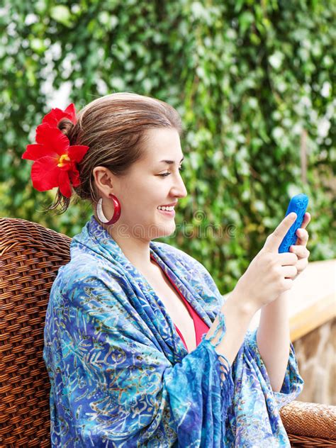 portrait of smiling beautiful woman texting with her phone stock image image of lady