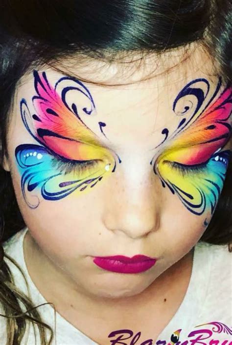 Butterfly With Rainbow Base And Fine Black Swirls And Teardrops Face Painting Tutorials Face